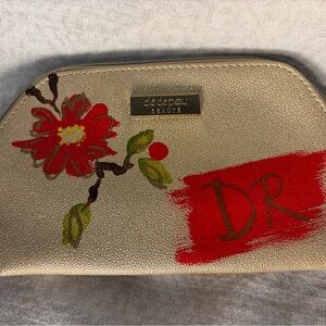 Gold Floral Cosmetic Pouch with Red Accent
